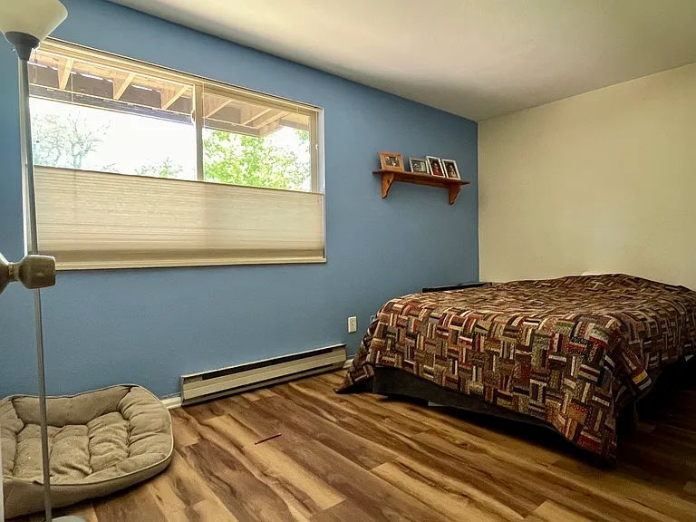 Bedroom w/ east window.