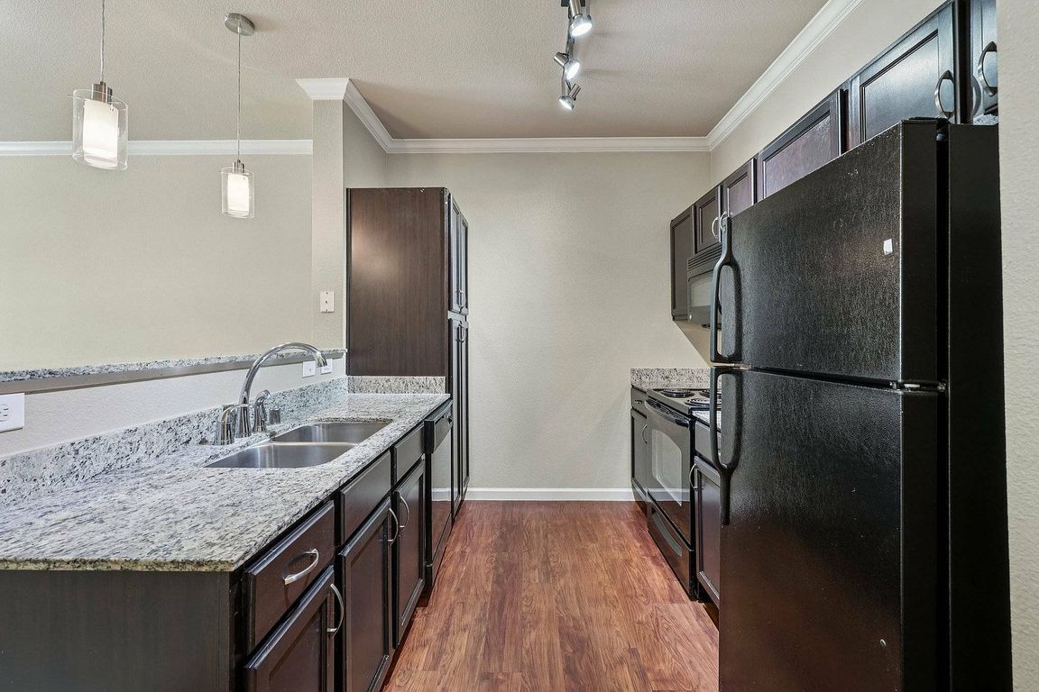 Create your favorite meals and enjoy entertaining in the open-concept kitchens at McDermott 55.