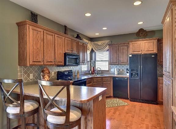 Large, eat-in kitchen with plentiful cabinet and counter space