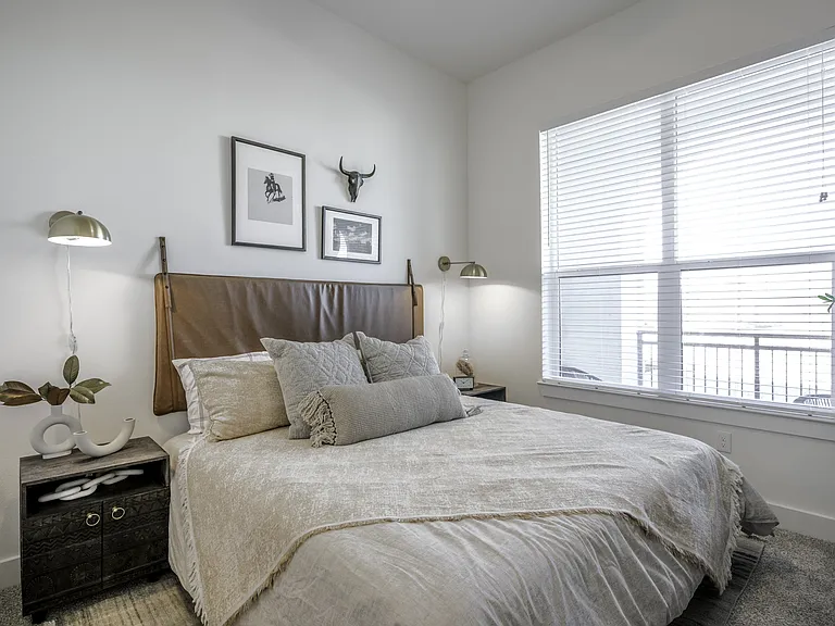 Embrace a bright and inviting living space as large windows invite an abundance of natural light into your home.