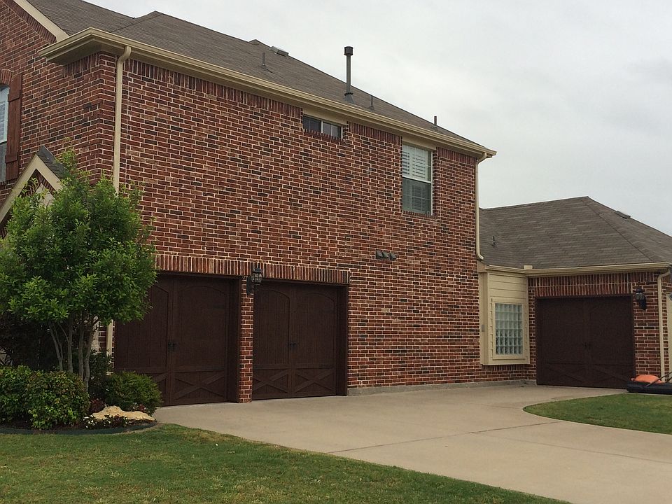 3 car cedar/insulated doors