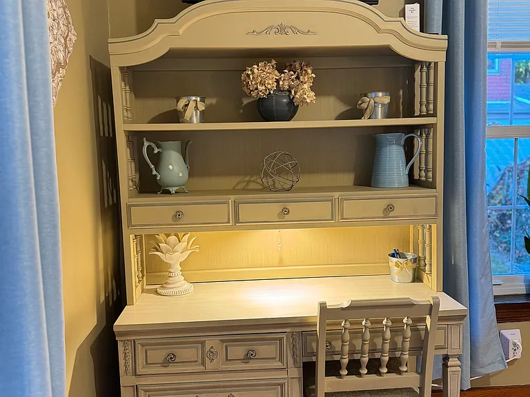 Notice the light above the work space of this desk in the front bedroom.