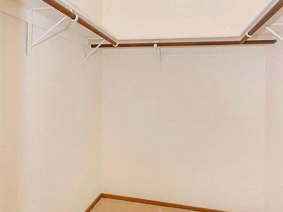 Guest Walk-in Closet (2016 photo) - No updates other than fresh paint