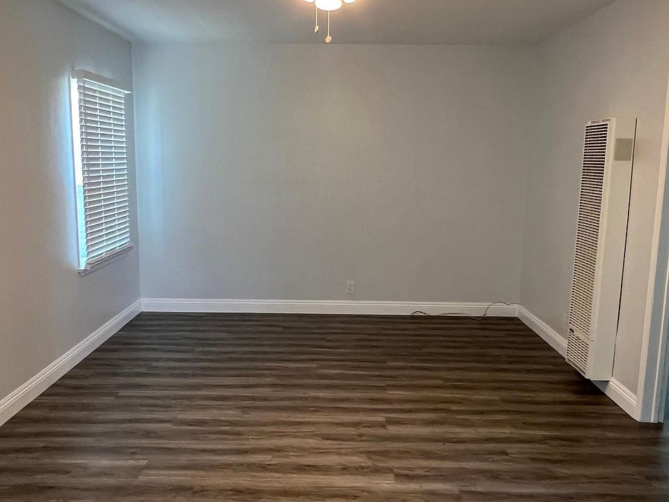 Newly installed vinyl plank flooring throughout the unit.