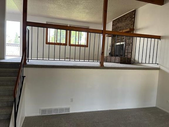 family room with wood burning fireplace