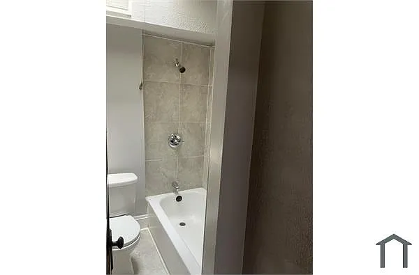 Building Photo - 3817 W Garrison Ave #B