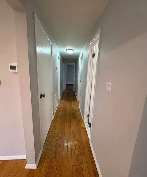 Hallway to bathroom and bedrooms