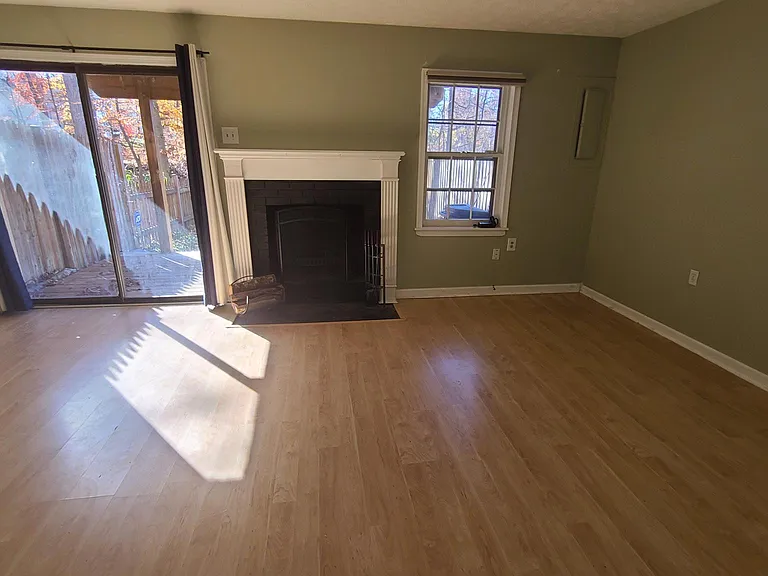 Enjoy this cozy large basement living space! Sit out on the wooden lower deck, private facing wooded lot