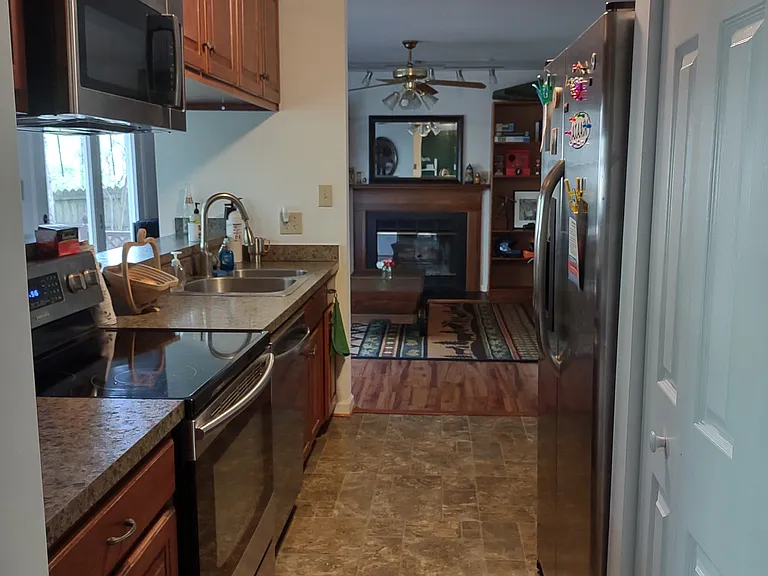 This photo has not been altered in any way: no edits or filters have been applied to try to deceive the viewer by having the room appear larger or brighter than it actually is.