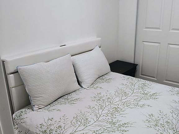 Main bedroom with bed and mattress