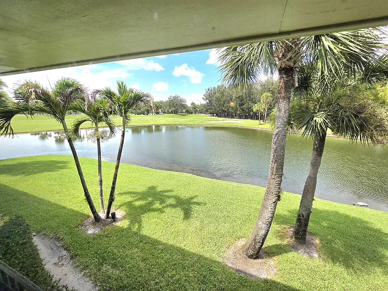 Stunning lake and golf course views from the living area!