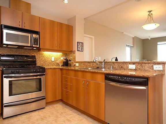 Gourmet Kitchen with Granite Counters and Stainless Appliances