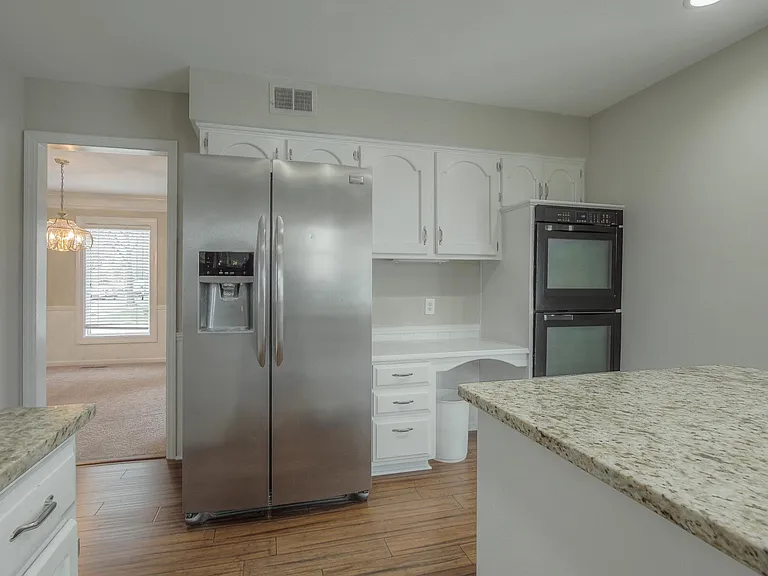 Stainless steel appliances throughout. Double oven for large-scale entertaining or big meals at home.