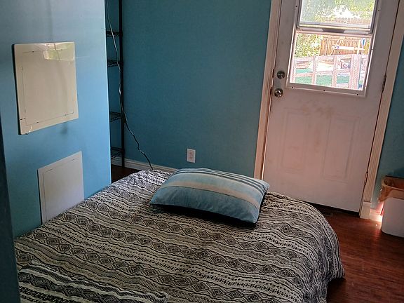 Inside the room with door to backyard