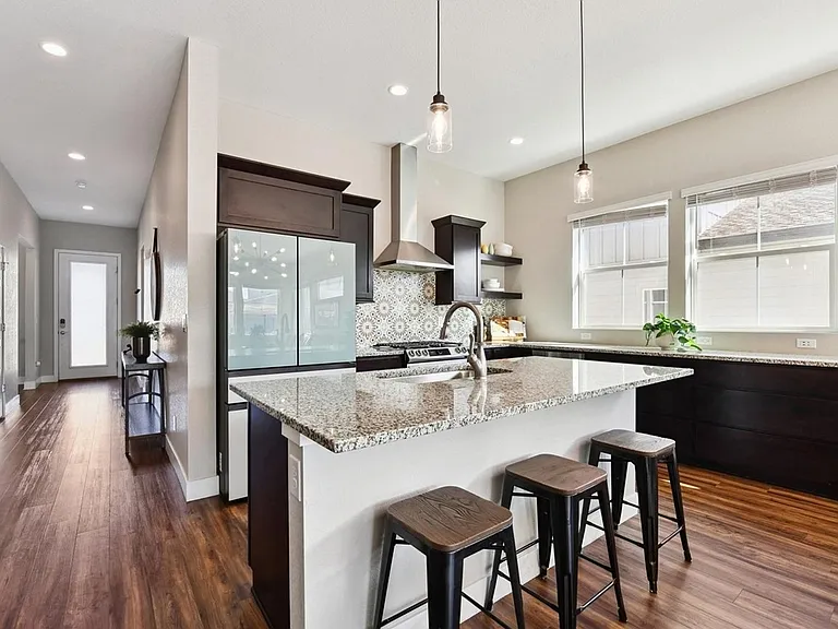 Appliances all new within 3 years or less. Additional pantry and storage space between garage and kitchen too.