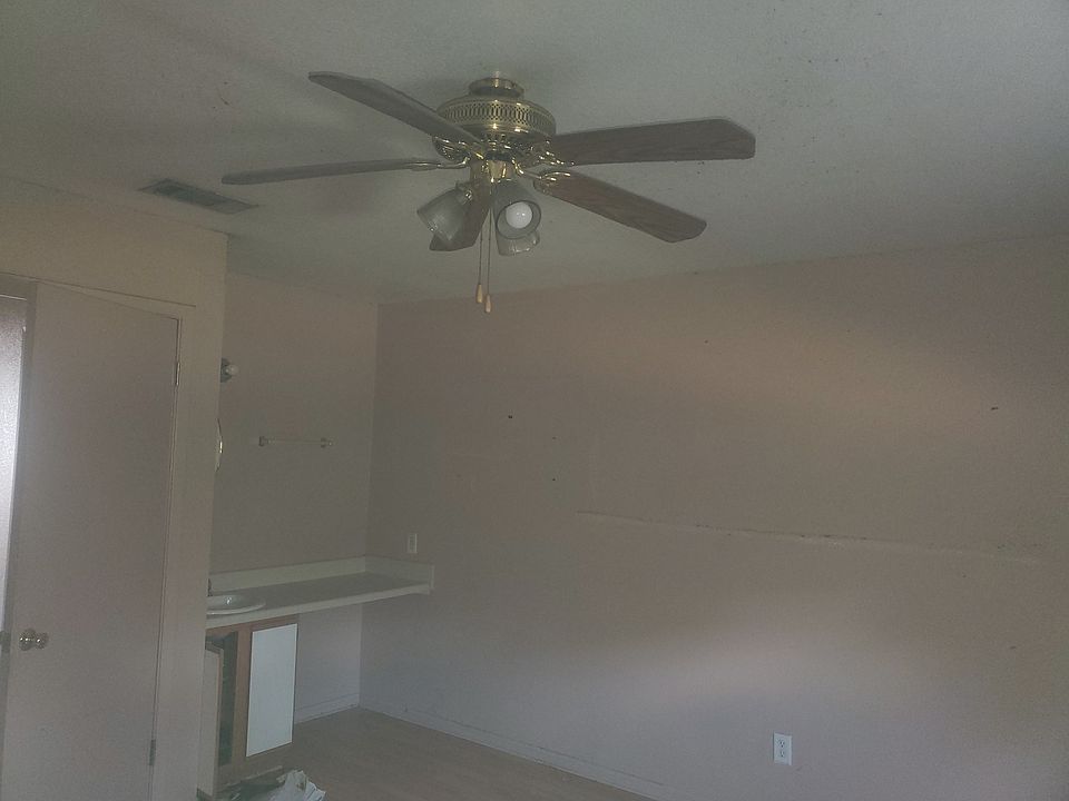 Main bedroom has a vanity.