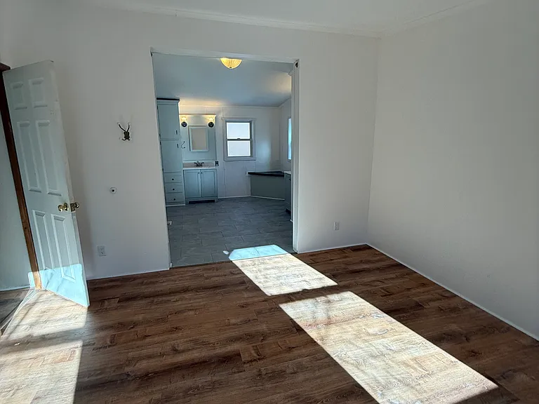 master bedroom into bathroom,