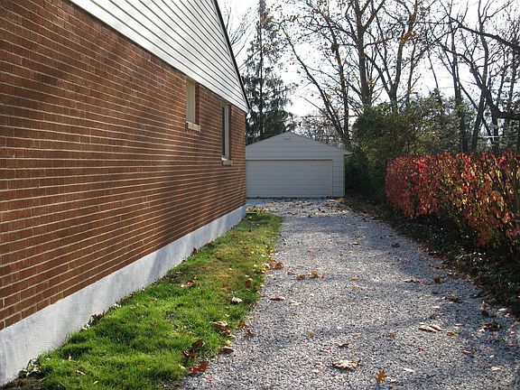 Side Driveway and Rear Garage
