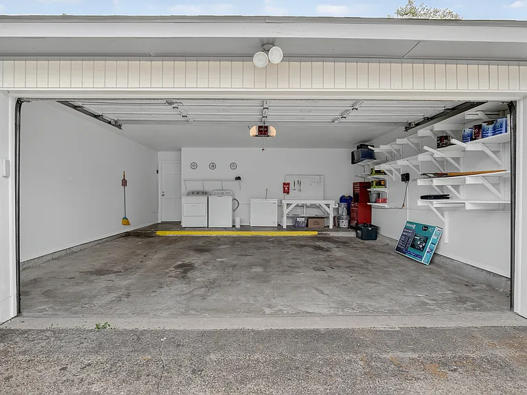 +2 car garage
+Additional driveway parking
+Storage shelving