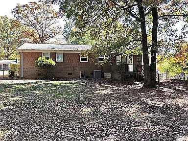 Big fenced backyard / small covered porch