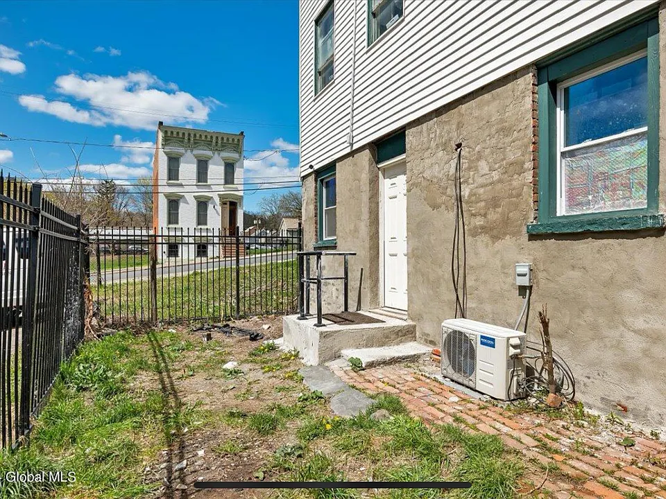 Apartment entrance in the rear - gated.