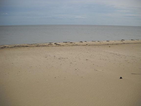 Large 1.5 story finished garage across the street.