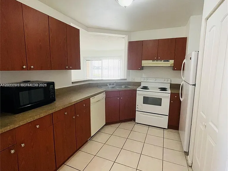 3449 NW 44th St #108 — Photo 3