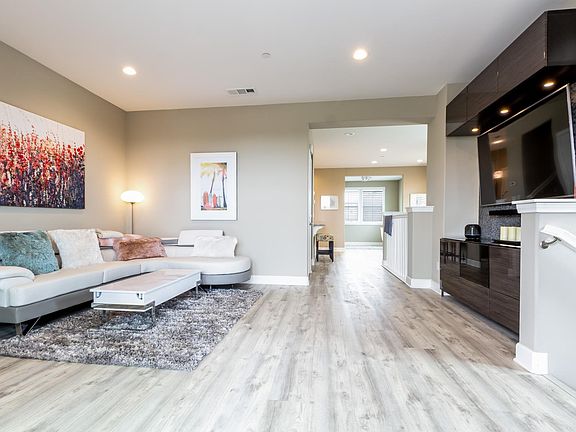 Spacious living room with laminate floors