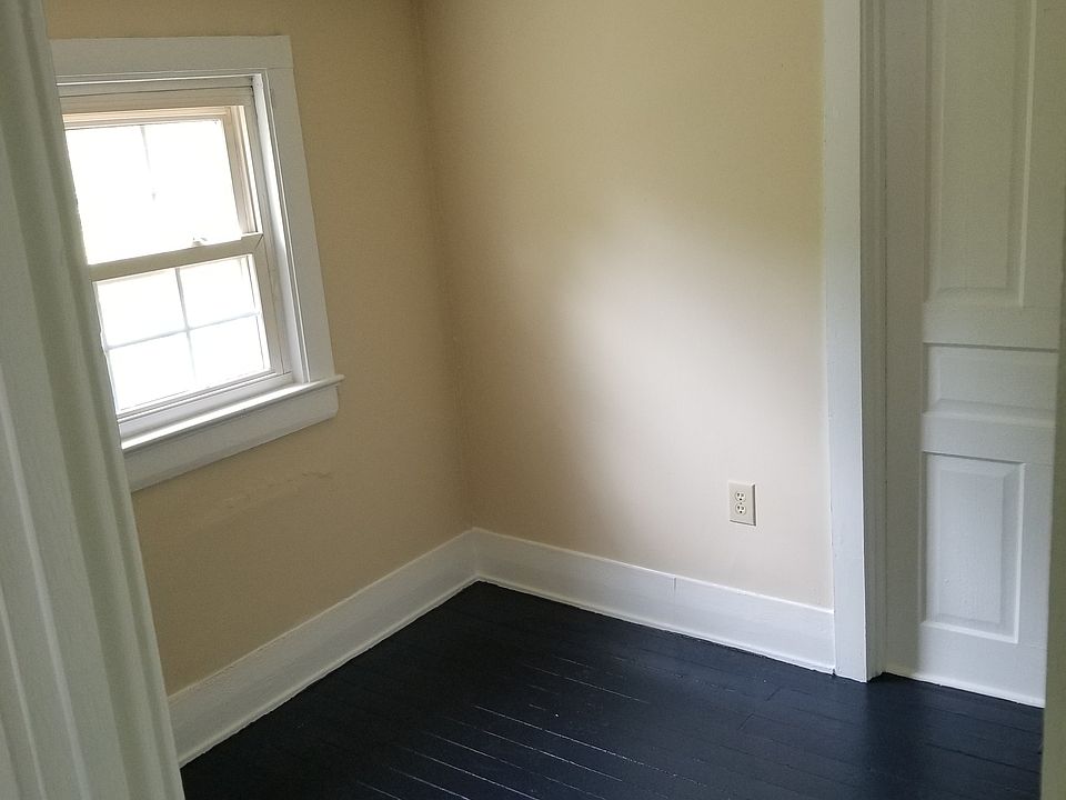 Single Bed bedroom, visible door sealed.