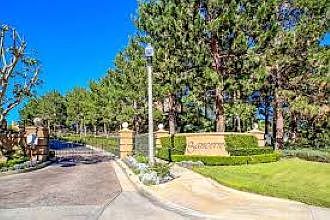 Secured gate with RFID tag entry for residents and keypad code for deliveries and guests