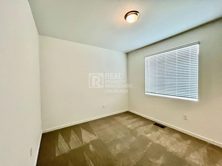 14591 W 91st Ln #C — Photo 44