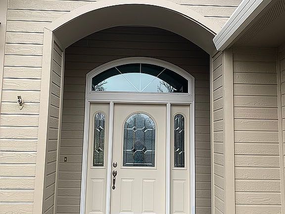 Front door with side porch