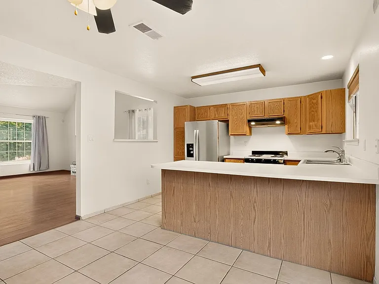 7817 Sunrose Dr NW — Photo 38