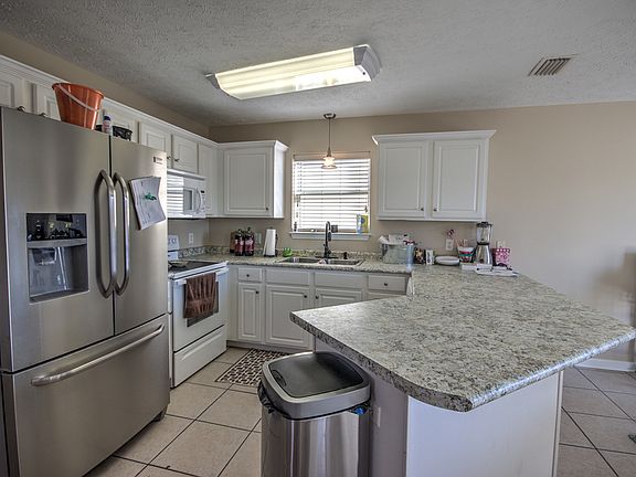 4th image of 11607 Sand Castle Ln