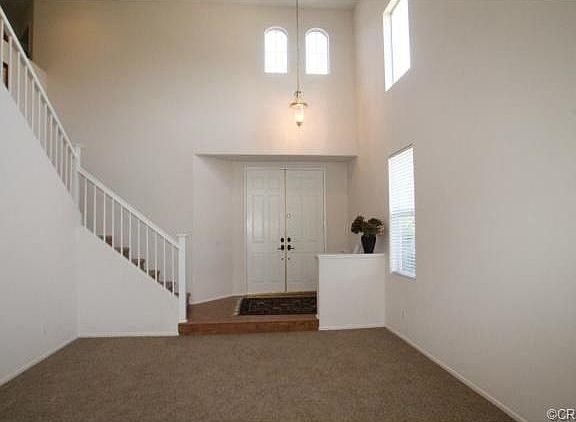 Beautiful staircase and entry.