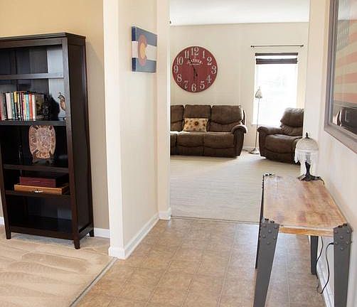 Large foyer leading to open floor plan