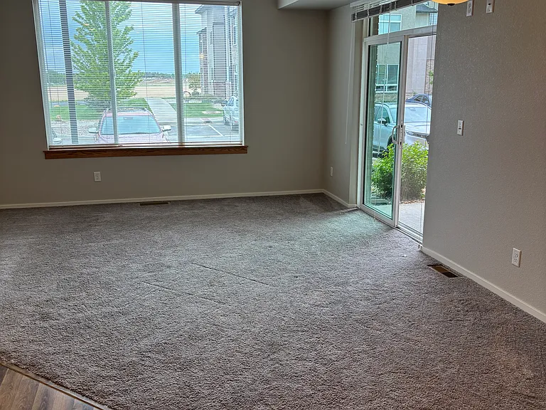 Living/Dining room offers exceptional views to include mountain views off of the deck.
