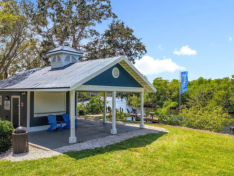 Unwind by the water in our charming pavilion steps from the dock.