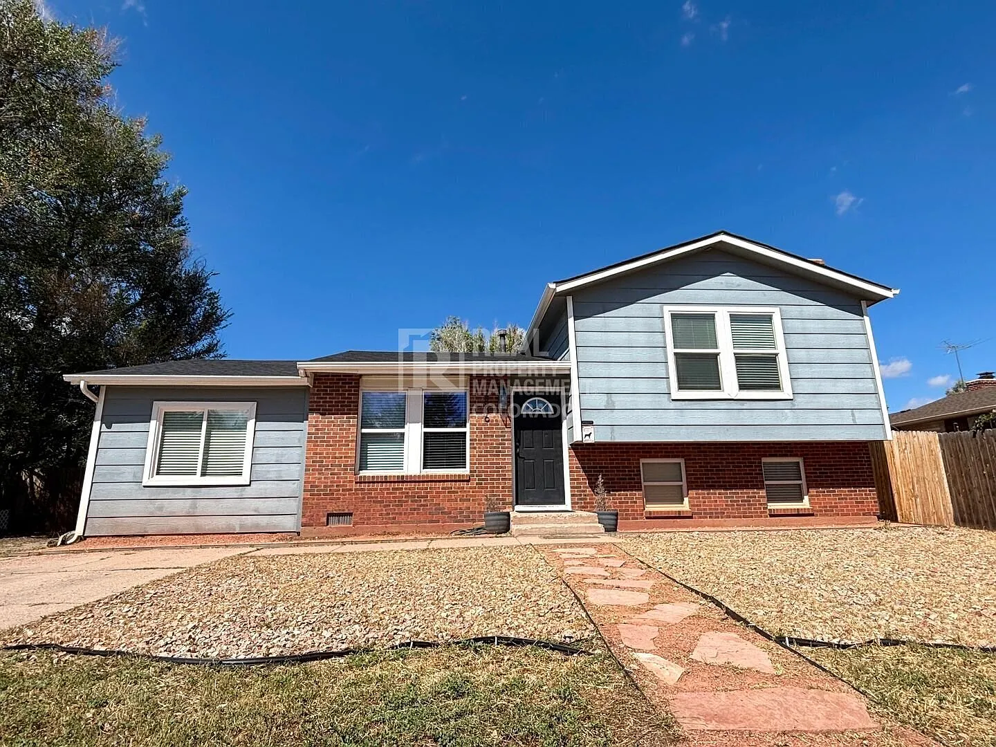 Character-Filled 4 Bedroom Home with Central AC & Large Fenced Yard | 10 Minutes to Peterson SFB — Photo 1