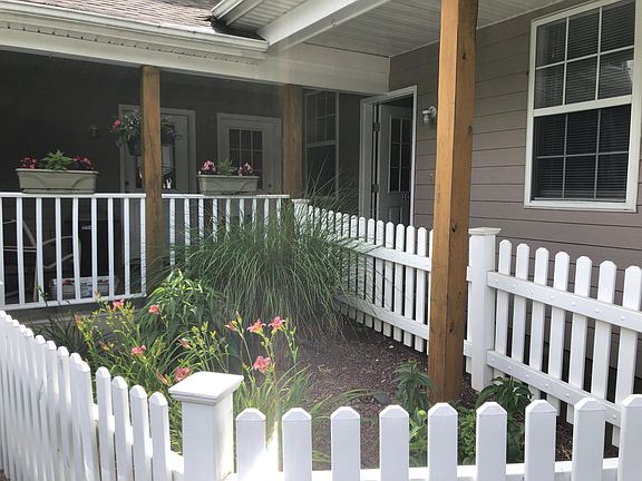 Your shared entryway is the middle door. At left is the common laundry room door. (Open door at right is the neighbor's.)