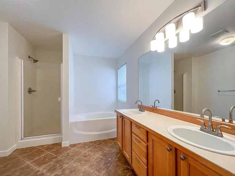 Master Bathroom with tile floor and recently upgraded fixtures