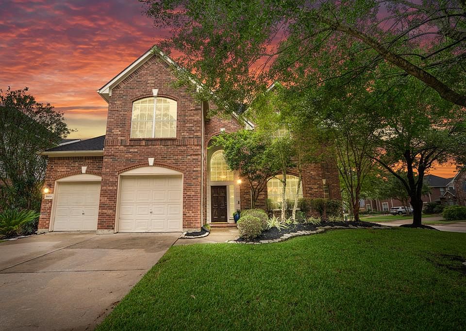 Welcome home to 9819 Heddon Oaks Court