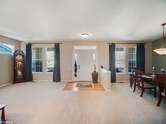 Entry and formal living and dining rooms.