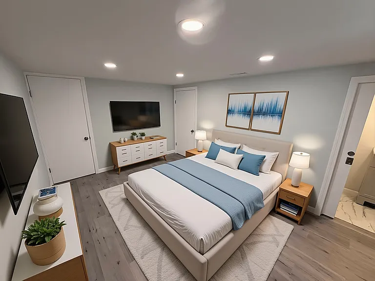 Spacious lower level bonus room set up as a 3rd bedroom