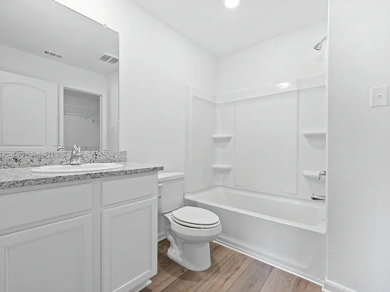 Master bathroom with a shower/tub combination.
