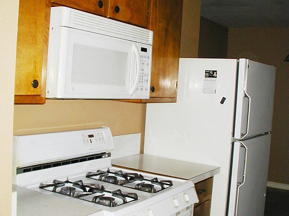 Kitchen with Gas Stove and Built in Microwave
