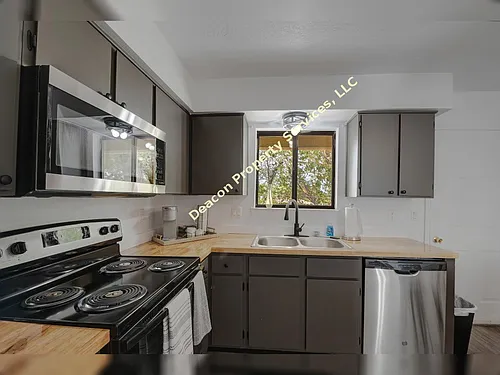 Decked Out! Fully Furnished, Just Renovated 2 Bedroom Beauty in the NE Photo 1