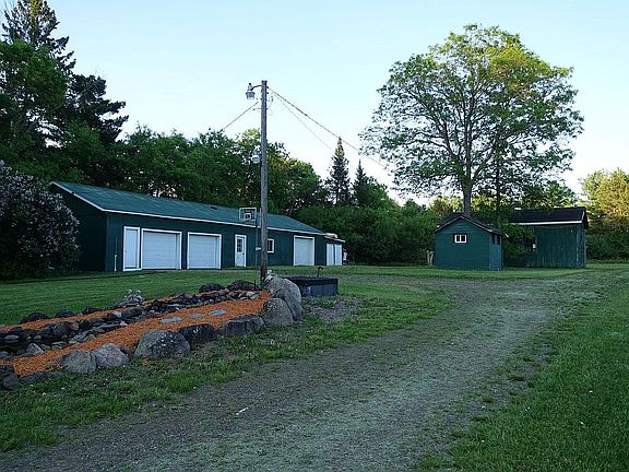 Man made pond, outbuildings