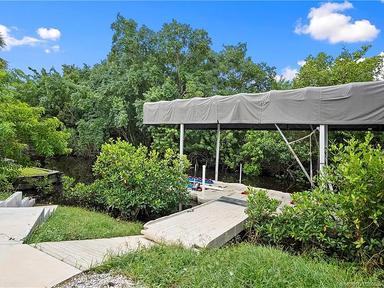 30 SW Hideaway Pl — Photo 28