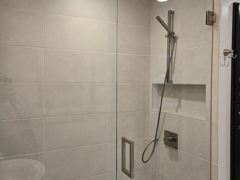Walk in Shower Cubicle showing one of the Double Shower Heads
